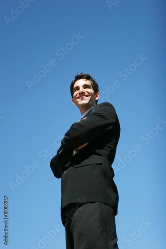 Successful businessman showing confidence © MaxFX