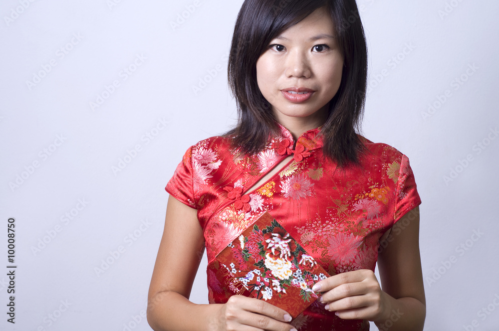 chinese lady in cheong sam and red packets chinese lady in cheong sam and red packets