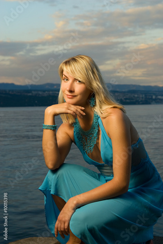 Young woman relaxing near the sea