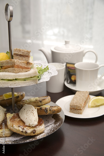 An arrangement of sandwiches and scones for afternoon tea