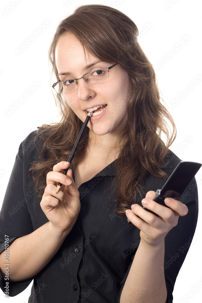 Attractive young secretary with glasses holding a cellphone. Attractive young secretary with glasses holding a cellphone.