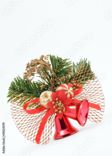 Two red christmas bells with ribbon