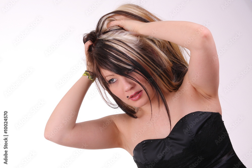 Young woman in studio with two color hair Young woman in studio with two color hair