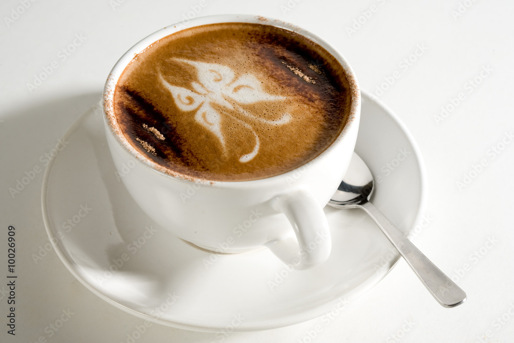 beautiful cup of hot coffee with butterfly design beautiful cup of hot coffee with butterfly design