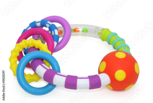 Tableau sur toile baby rattle on white background