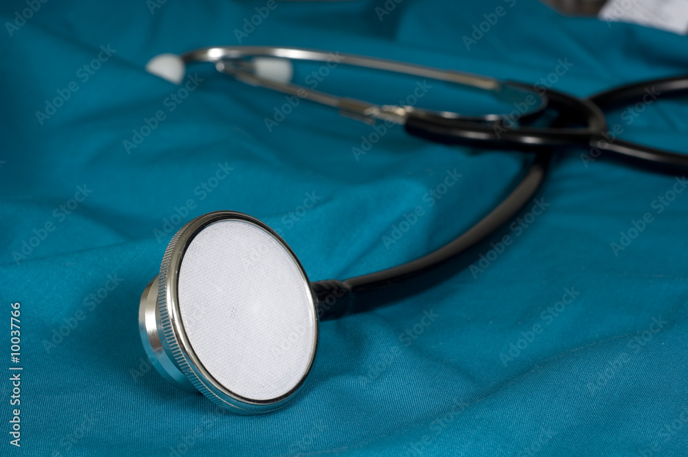 A doctor or nurses stethoscope on green scrubs A doctor or nurses stethoscope on green scrubs