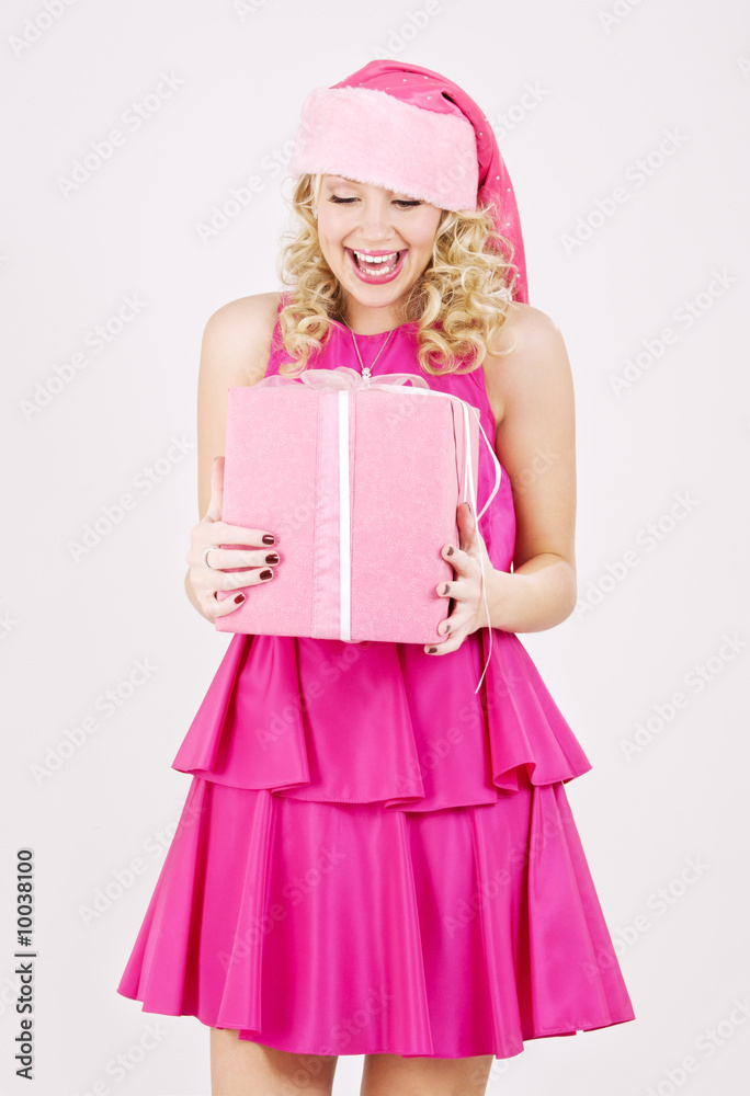 picture of cheerful santa helper girl with gift box picture of cheerful santa helper girl with gift box