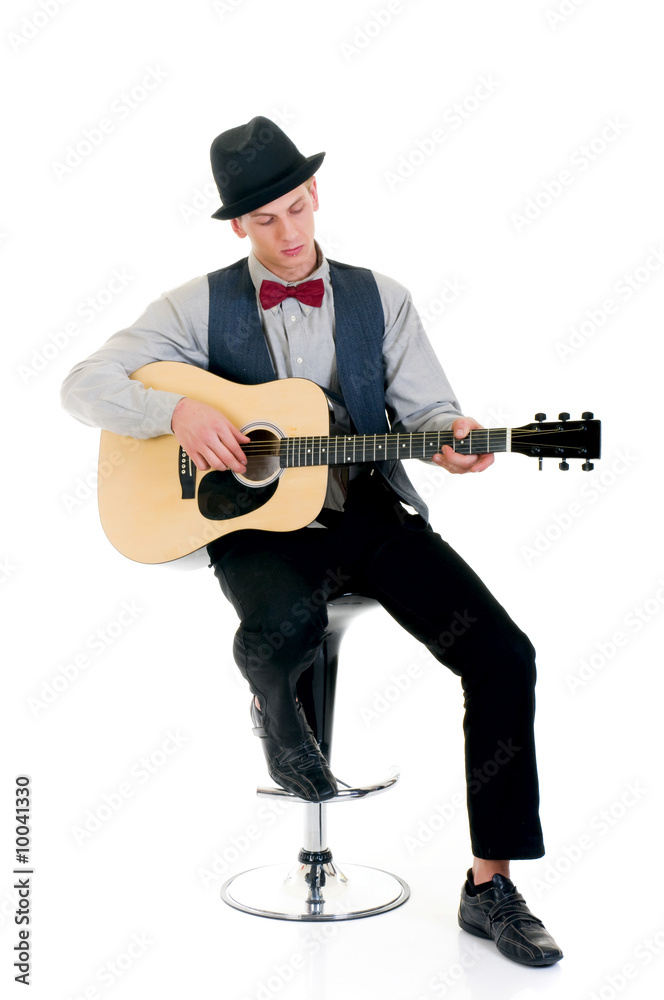Handsome young male guitar player. Studio shot, Handsome young male guitar player. Studio shot,
