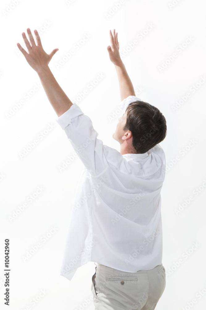Image of excited man keeping his arms raised Image of excited man keeping his arms raised