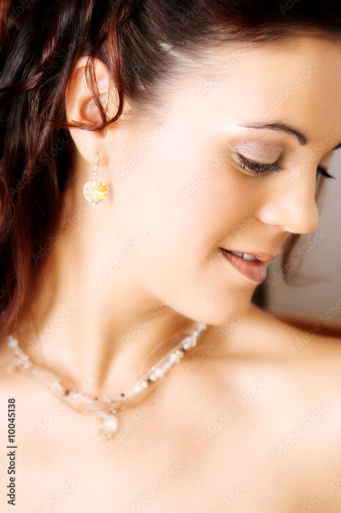 Beautiful brunette bride with heart shaped jewelery