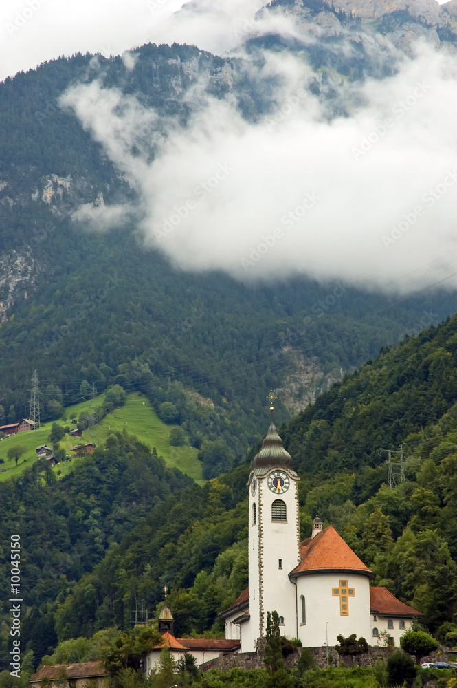 Alpine church in mountains