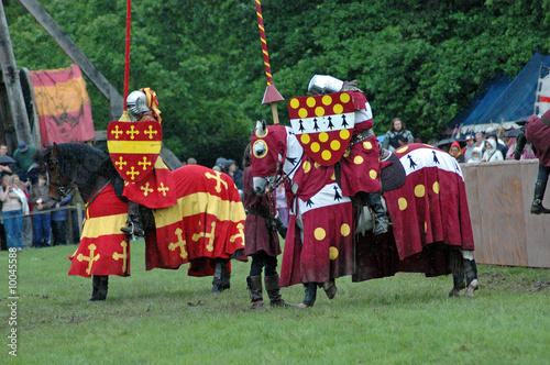 Knights on horses in armor before duel