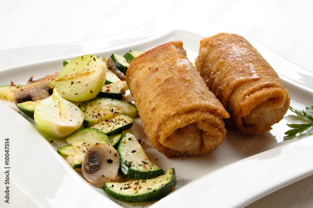 Stuffed fried pancakes with meat and vegetable salad Stuffed fried pancakes with meat and vegetable salad
