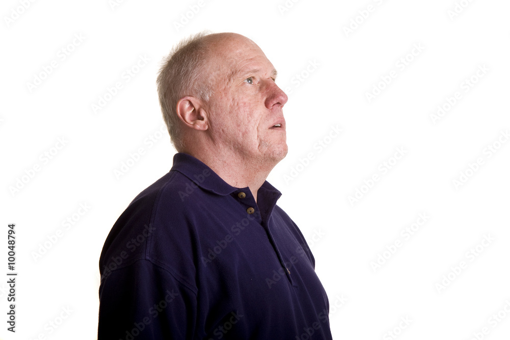 An older bald guy looking up and to the right An older bald guy looking up and to the right