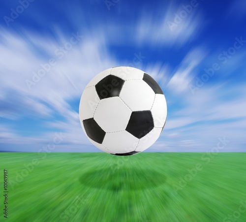 flying ball over grass
