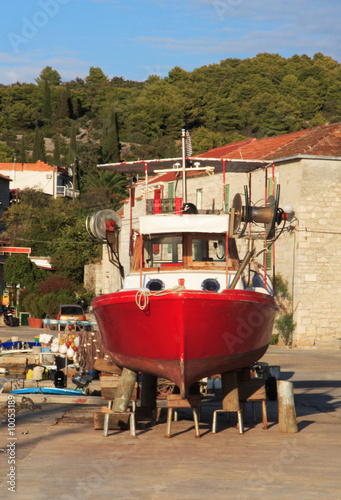 red fishing boat photo