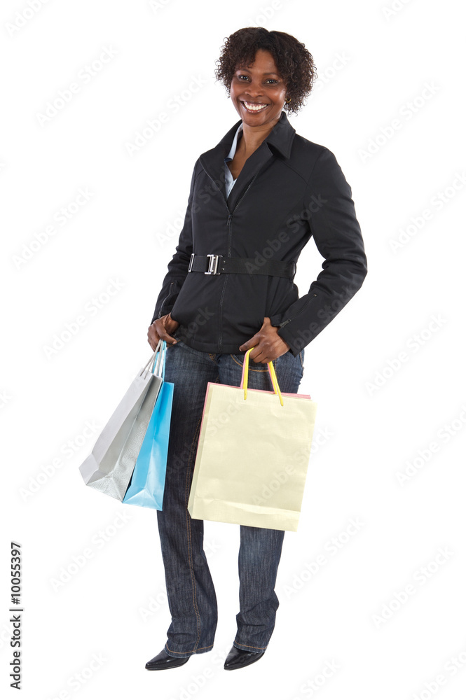 Attractive shopping girl a over white background Attractive shopping girl a over white background