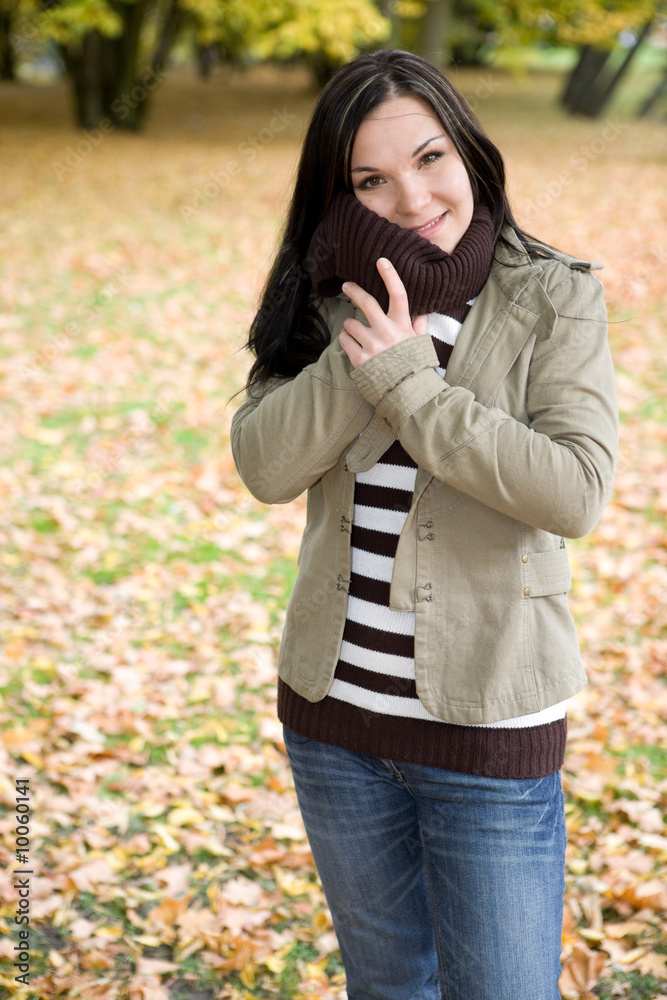 attractive brunette woman relaxing in park attractive brunette woman relaxing in park