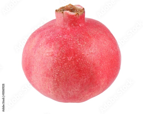 Pomegranate with water drops isolated on white