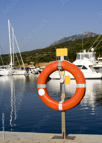 a life buoy at a yacht port