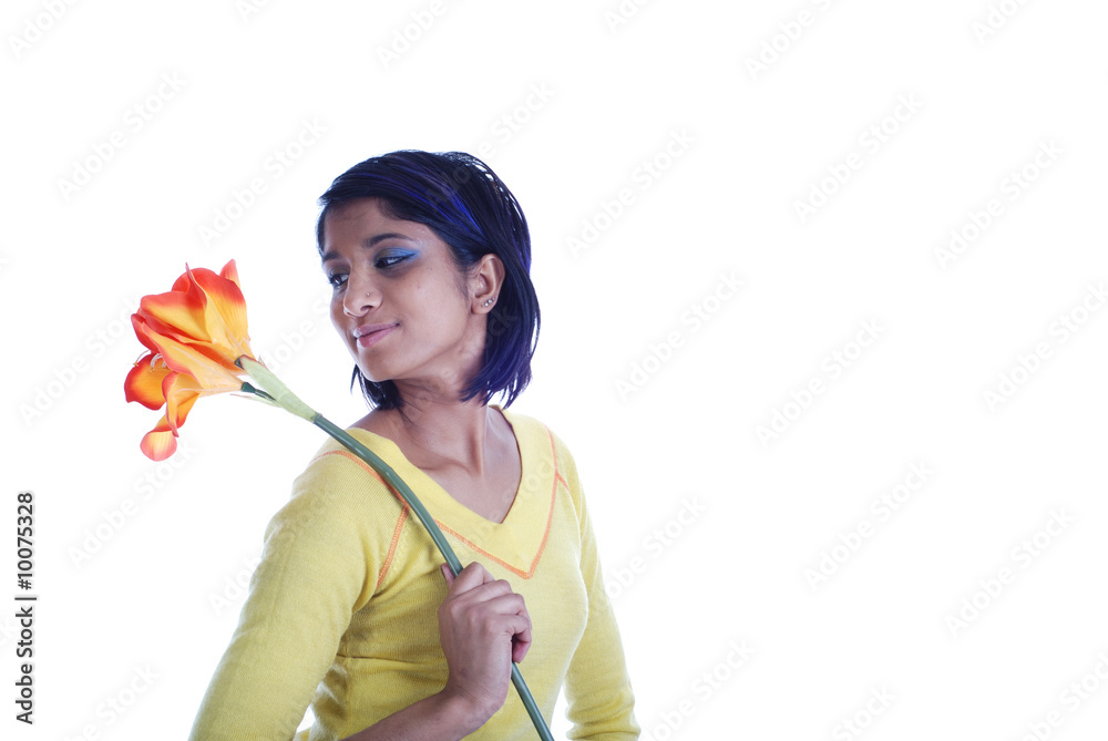Picture of one girl and orange artificial flower Picture of one girl and orange artificial flower