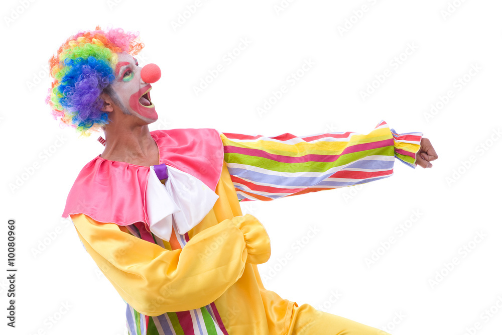 funny and colorful clown making a face on white background