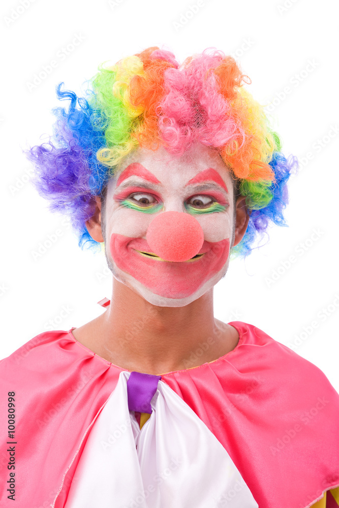 funny and colorful clown making a face on white background funny and colorful clown making a face on white background