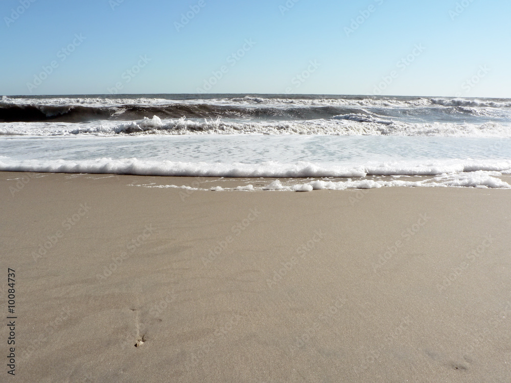 foamy surf on Virginia Beach that includes copy space foamy surf on Virginia Beach that includes copy space