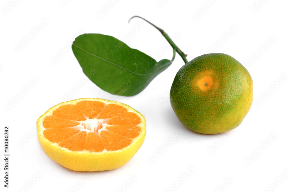 Tangerine and a half on white background Tangerine and a half on white background