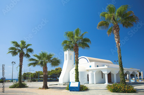 White church and palms, Agia napa, Cyprus photo