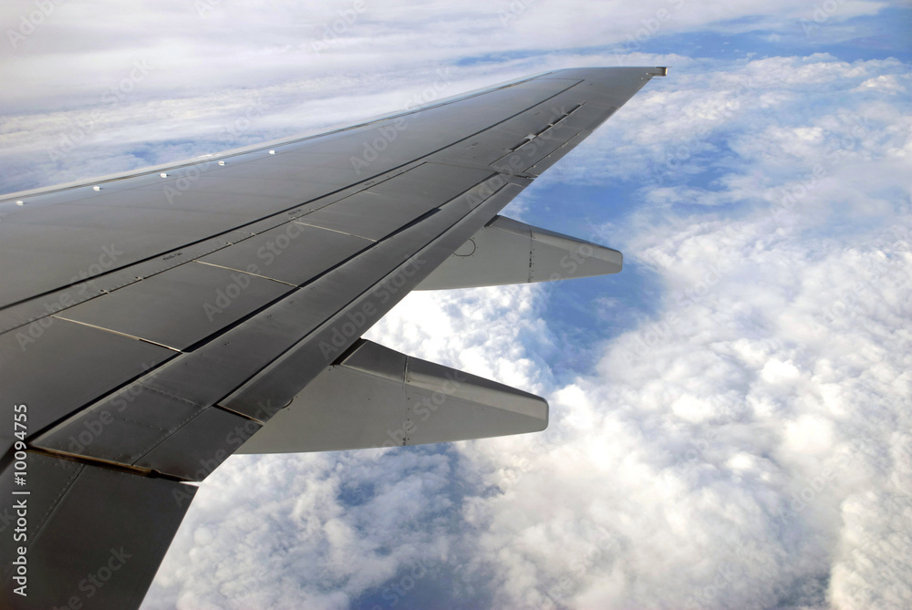 Image of a wing plane in sky.