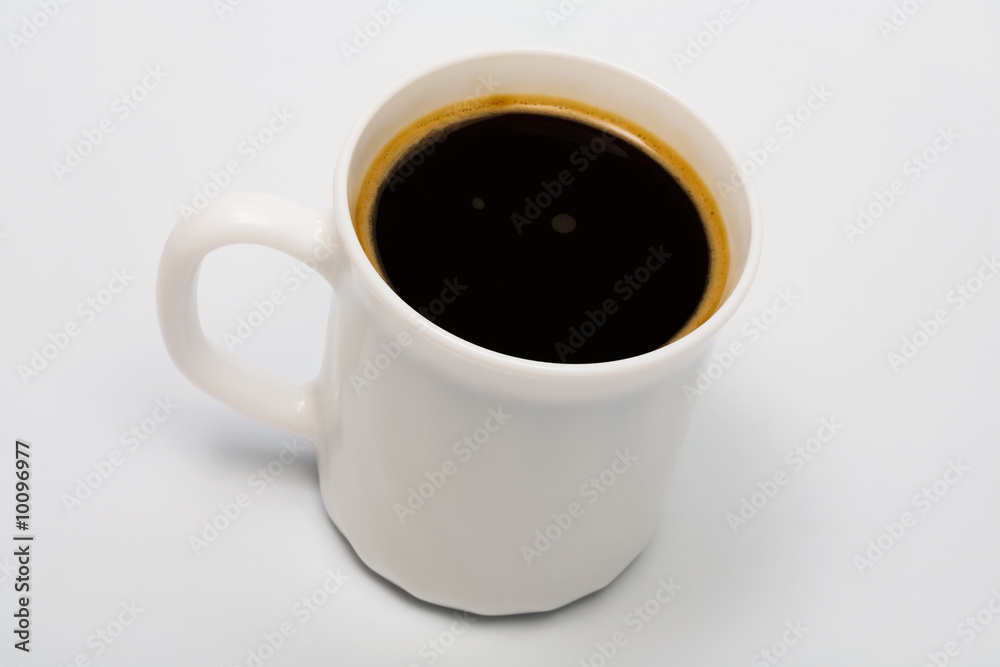 Strong black coffee in a beautiful white cup Strong black coffee in a beautiful white cup