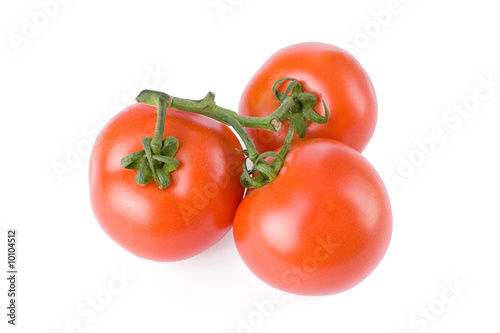 Ripe tomatoes isolated on a white background © StockPhotosArt