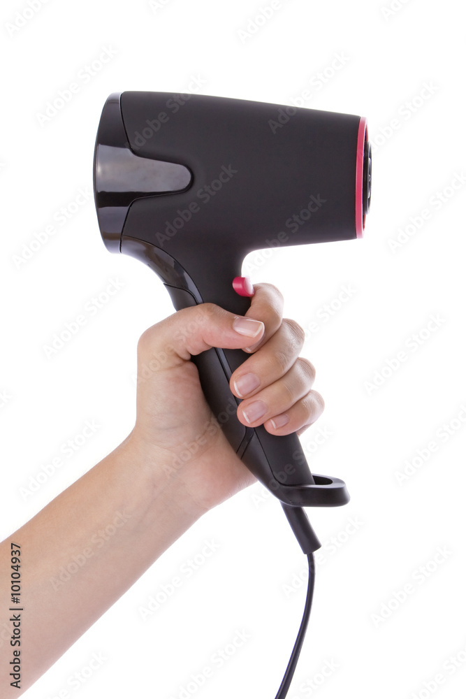 Hand holding a hairdryer isolated on a white background Hand holding a hairdryer isolated on a white background
