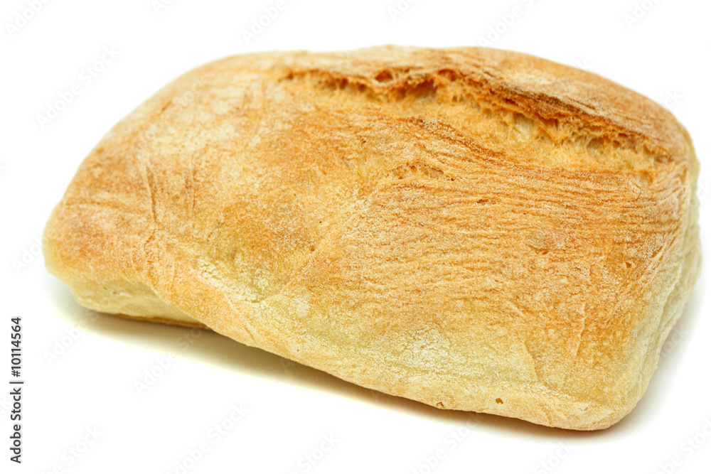 Typical home-made mediterranean bread isolated over white Typical home-made mediterranean bread isolated over white