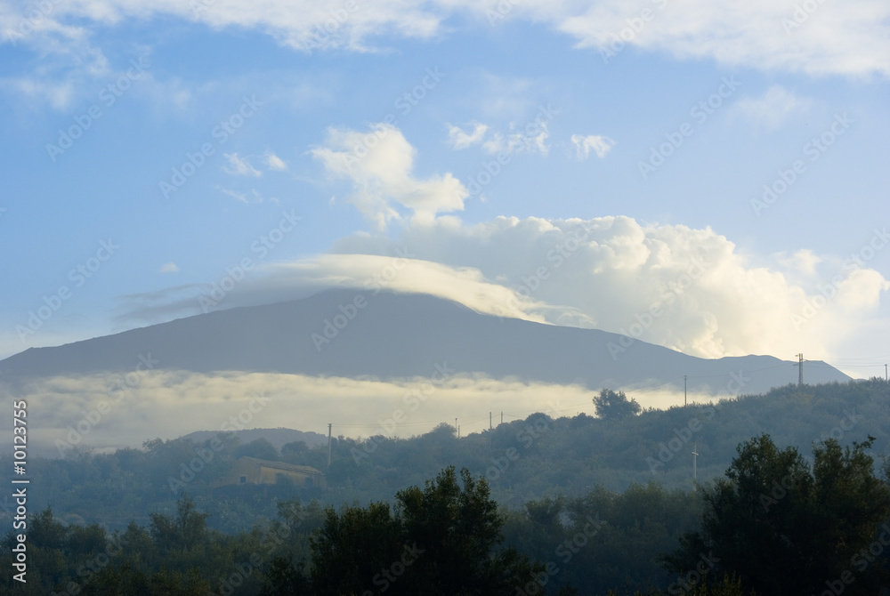 panorama volcano etna cloud cover and fog