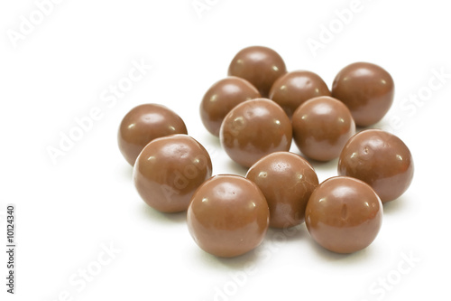 Round bonbons isolated on white.