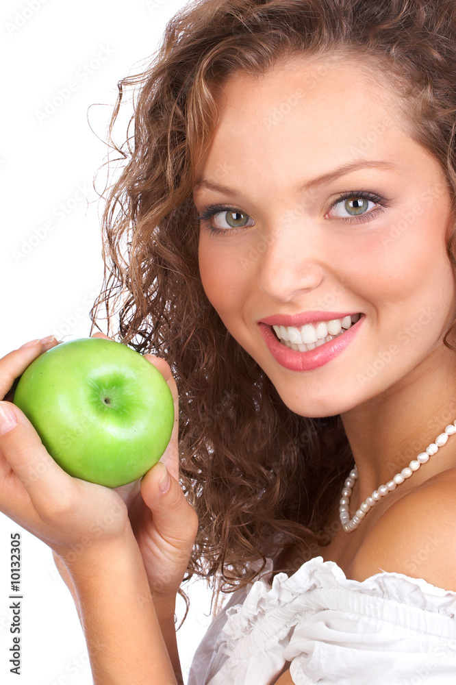 Beautiful young woman eating a green apple. Isolated over white. Beautiful young woman eating a green apple. Isolated over white.