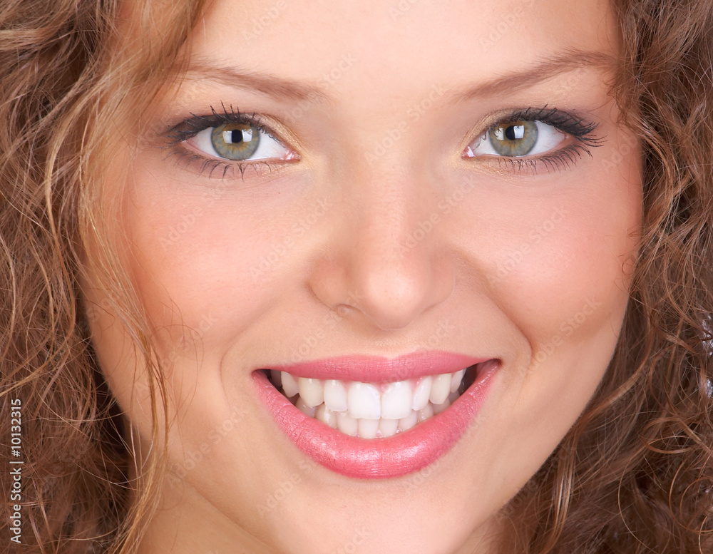 Beautiful young woman smiling. Isolated over white background. Beautiful young woman smiling. Isolated over white background.