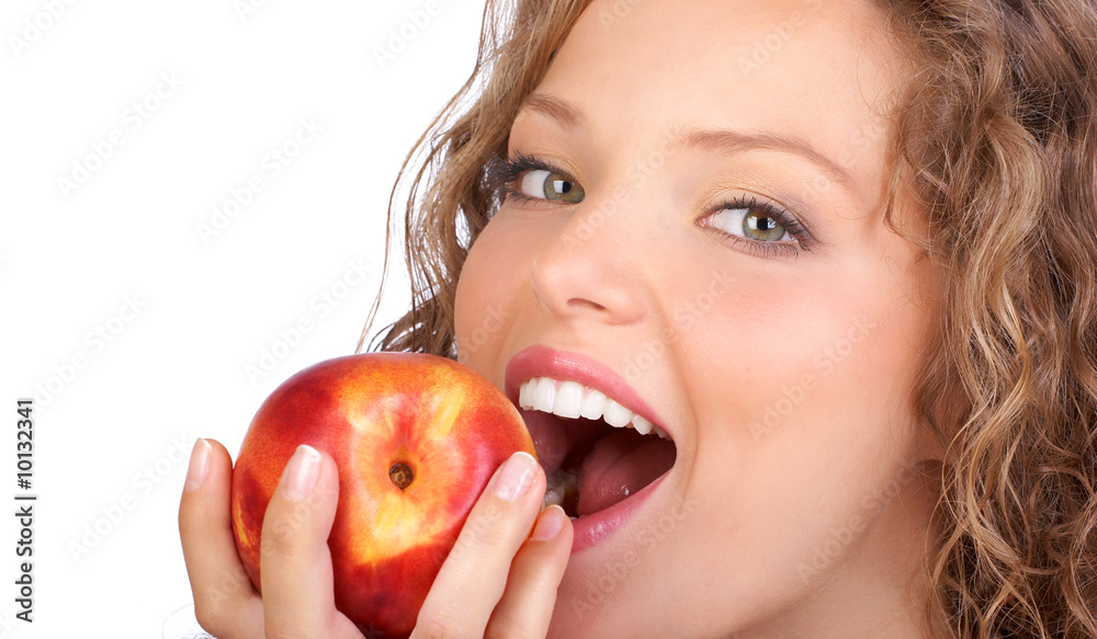 Beautiful young woman eating a red apple. Isolated over white. Beautiful young woman eating a red apple. Isolated over white.