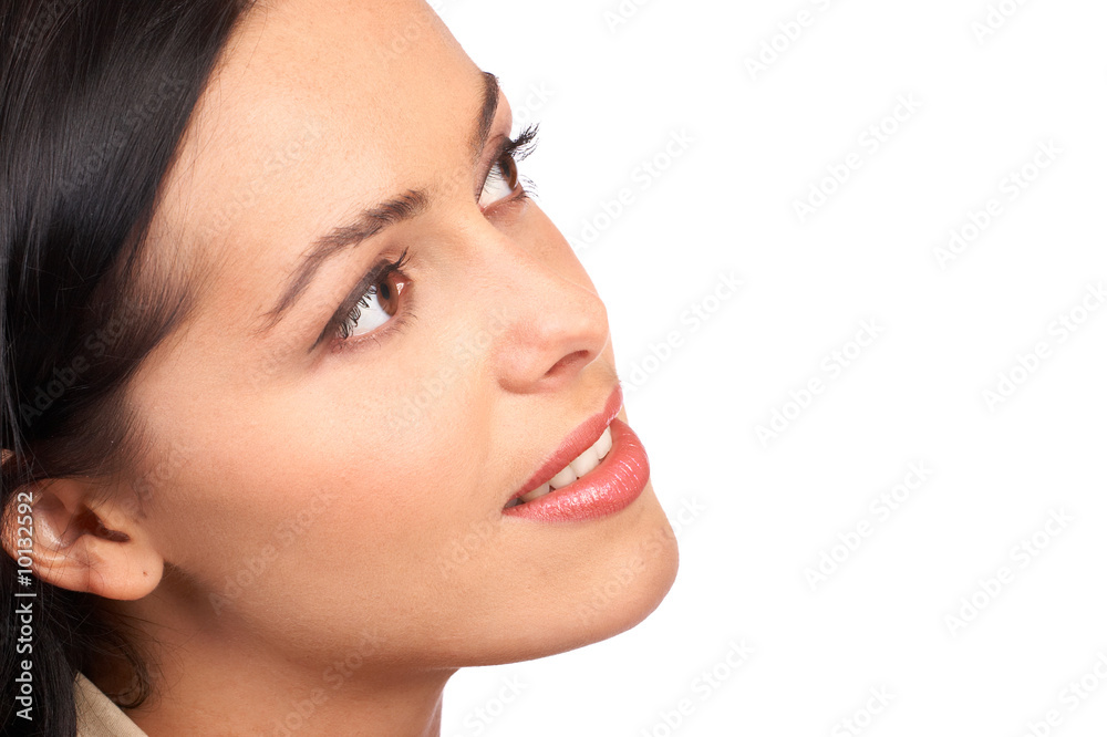 Beautiful young woman smiling. Isolated over white  background.