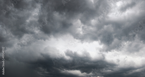 Overcast sky with storm clouds. Four shots composite picture.