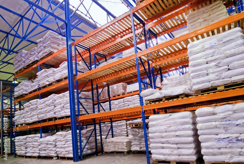 shelves stacked with goods in warehouse