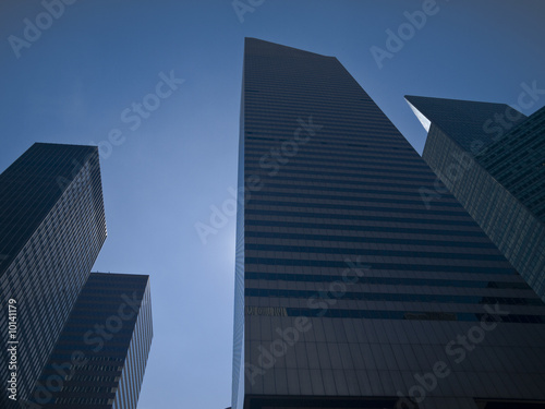 High modern skyscrapers on a background of a blue sky.