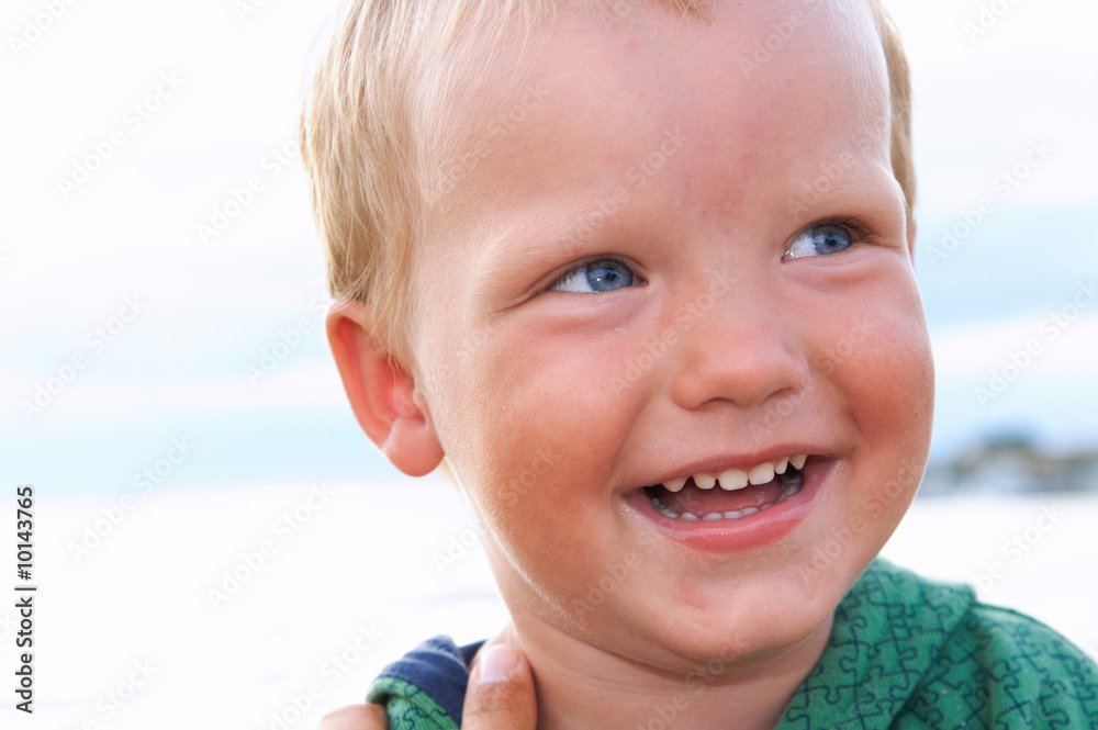 Small boy portrait on evening sandy sea coast Small boy portrait on evening sandy sea coast