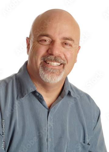 happy middle aged man with bald shaved head