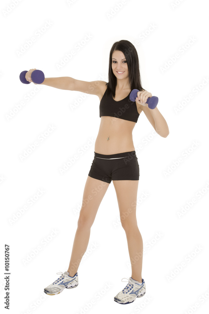 Beautiful Caucasian woman working out with dumbbells Beautiful Caucasian woman working out with dumbbells