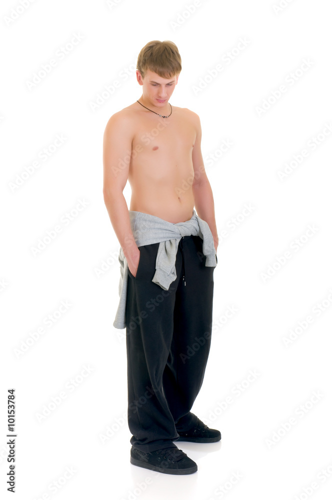 Fototapeta premium Young attractive pensive man, wearing fitness outfit, sweater