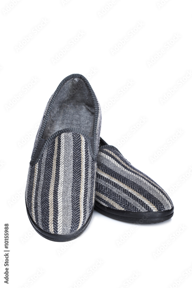A pair of male slippers isolated on white background A pair of male slippers isolated on white background