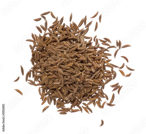 Seeds of dried caraway closeup isolated on white